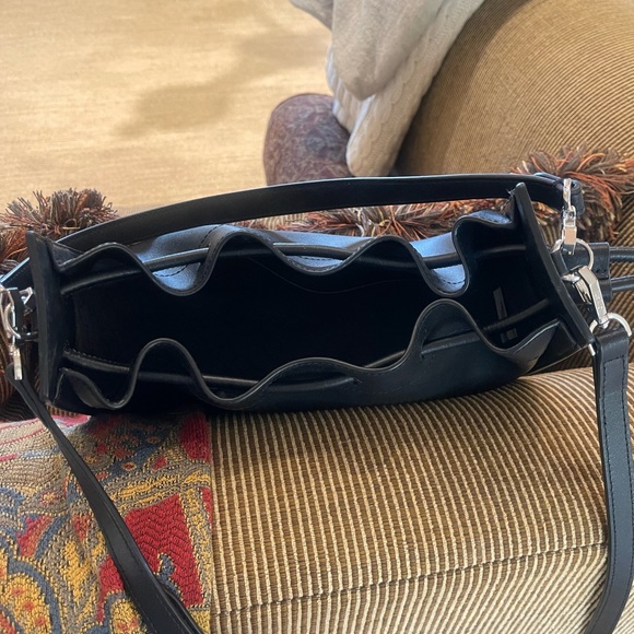 Black leather drawstring Oryany drawstring bucket bag. - Picture 12 of 15